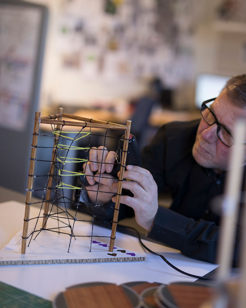 HAGS office employee working on a 3D design for playgrounds.